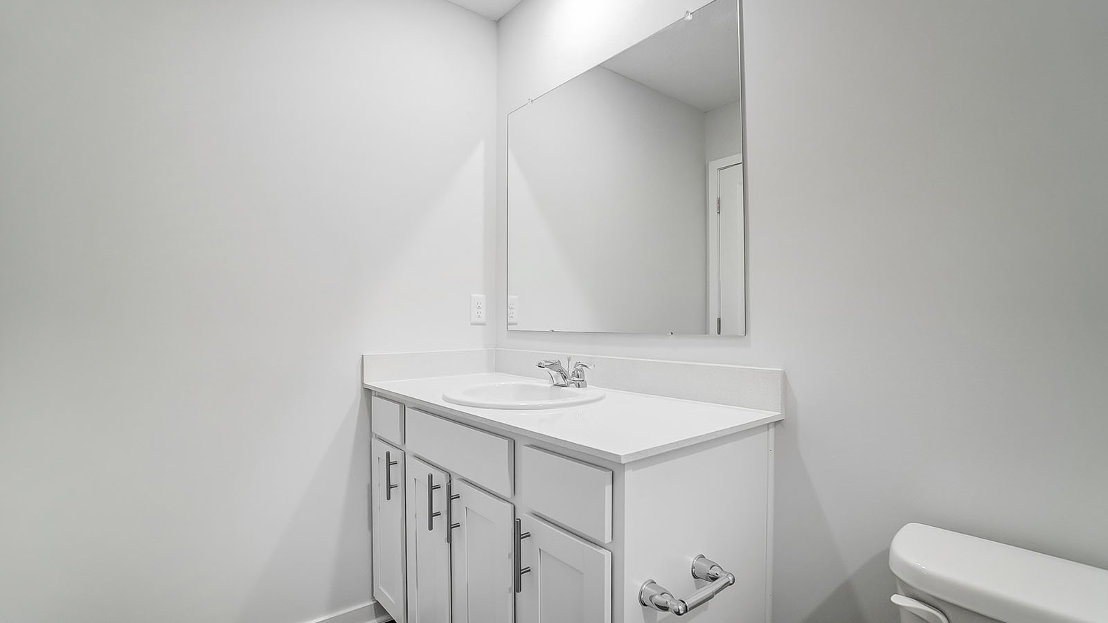 Bathroom featuring a sink, toilet, and shower tub.
