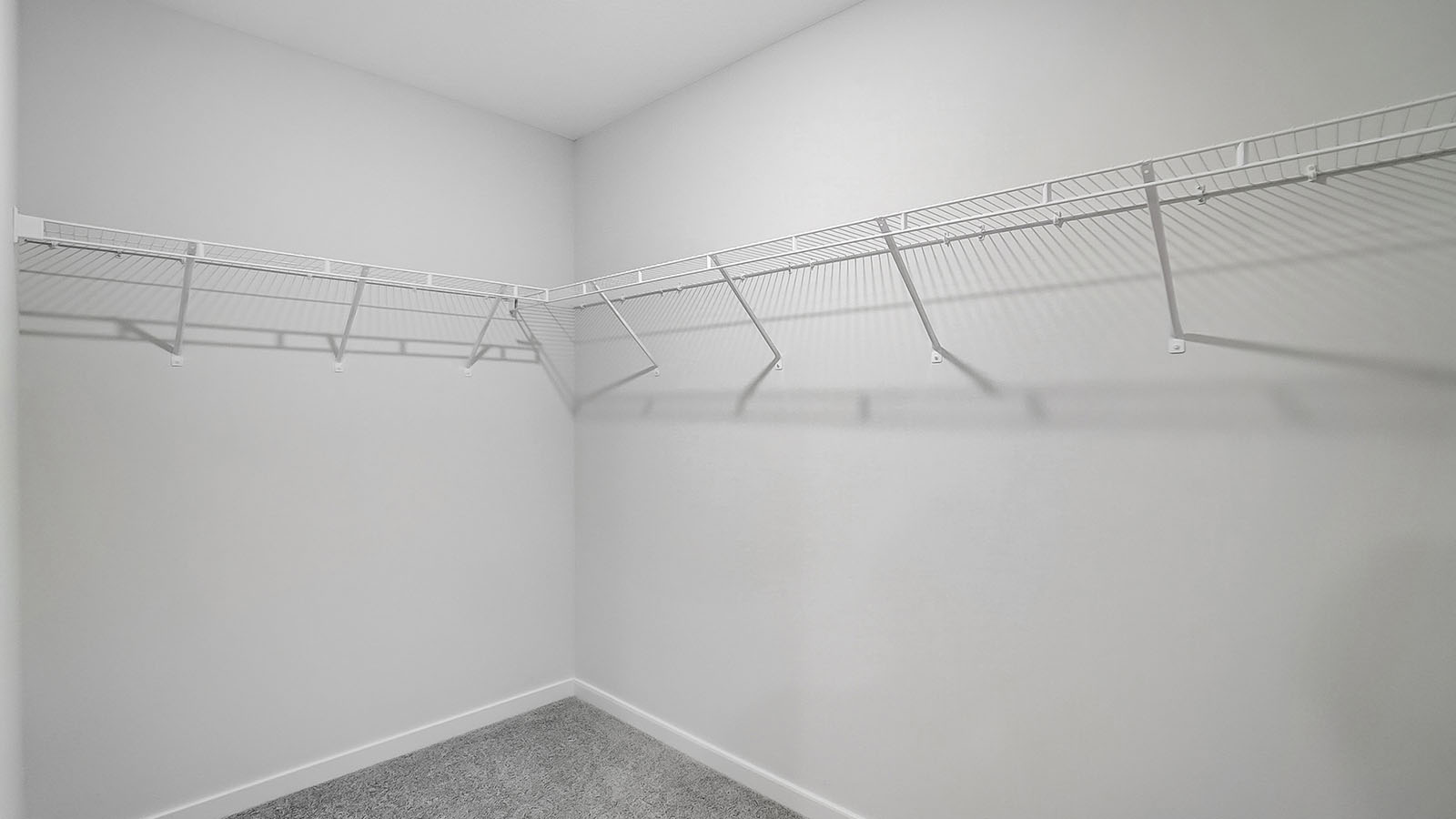 Walk in closet attached to the primary bathroom.