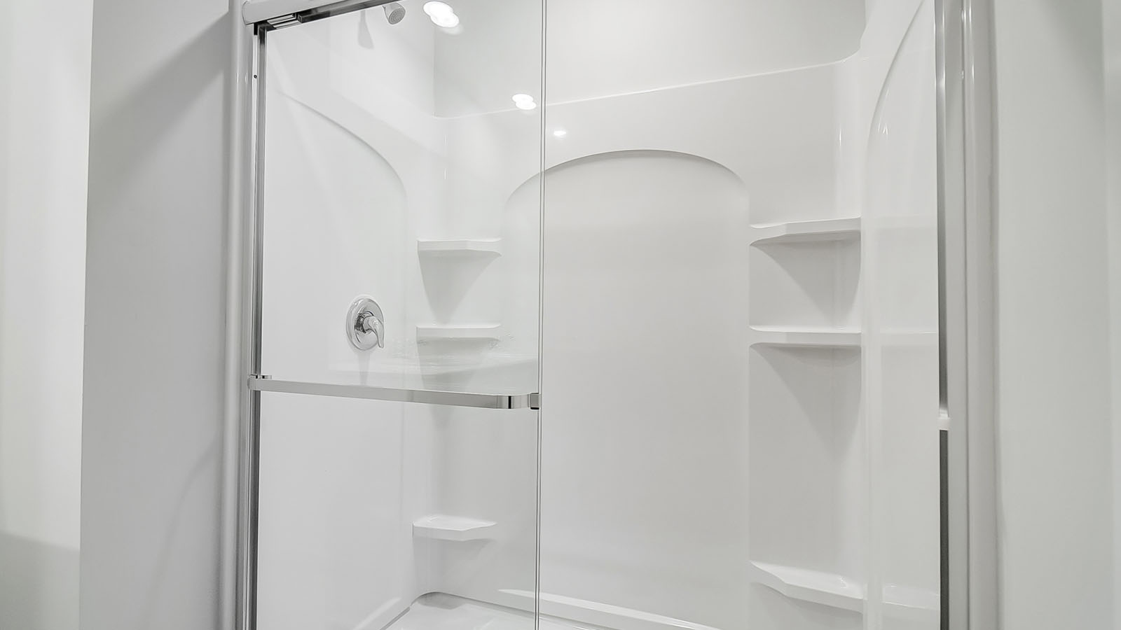 Bathroom featuring a sink, toilet, and shower tub.