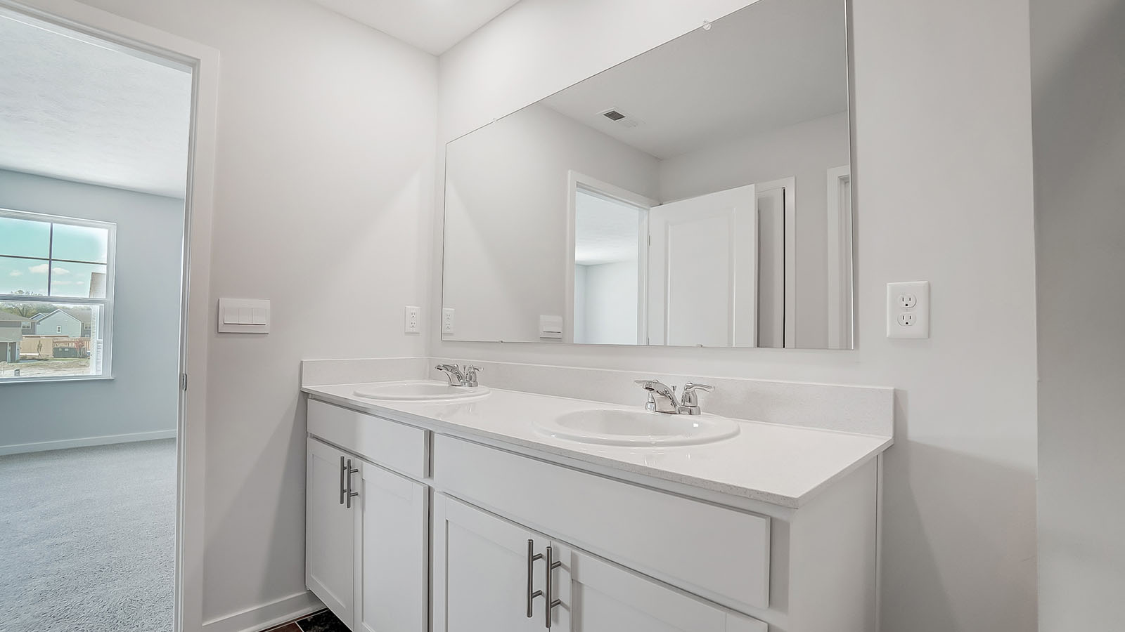 Bathroom featuring a sink, toilet, and shower tub.