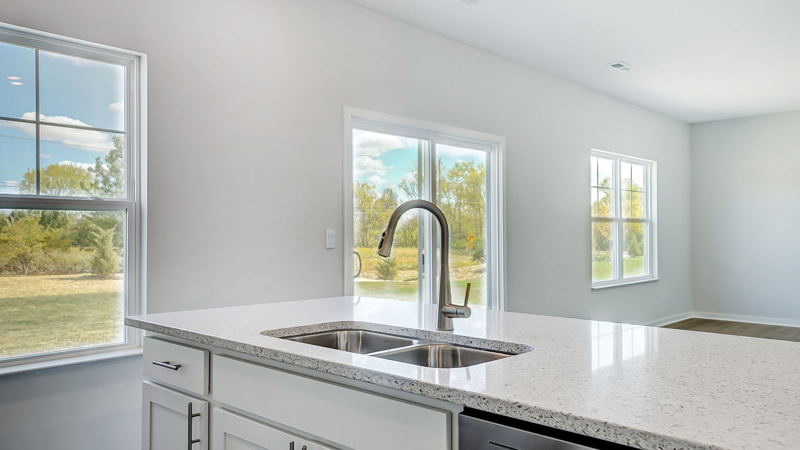 Kitchen island overlooking spacious living area.