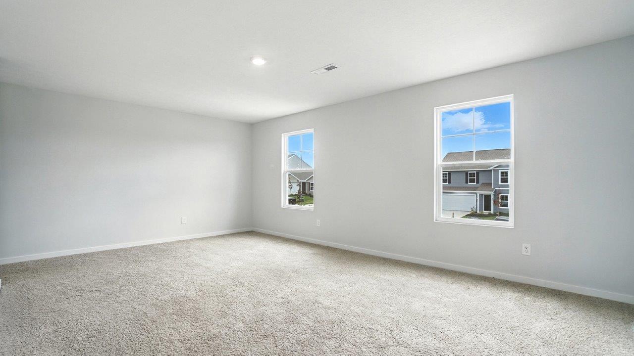 primary bedroom with single windows