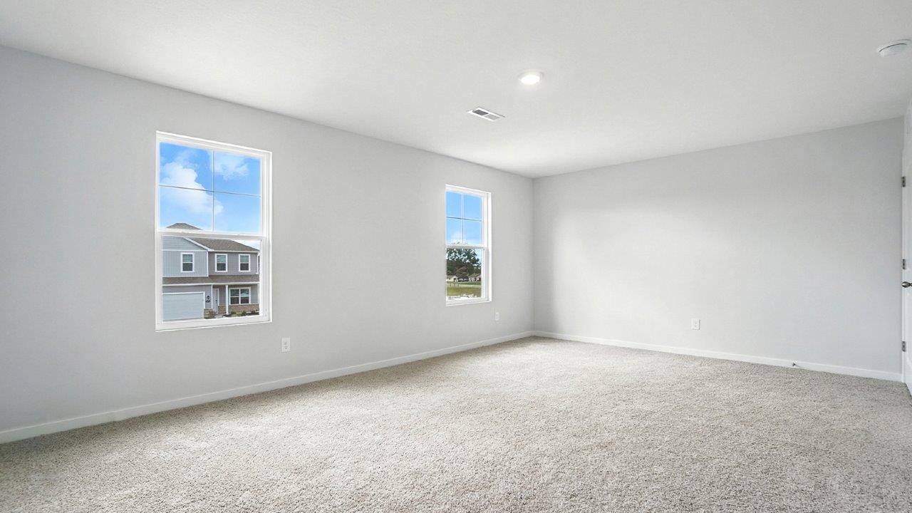 primary bedroom with single windows