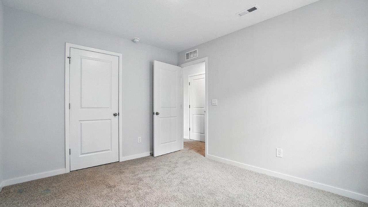 third bedroom closet and entry