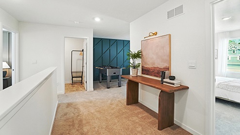 Hallway space with long wood sofa table