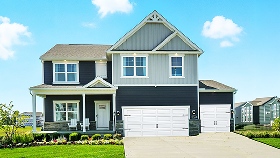 Piatt Preserve Henley model home with blue siding