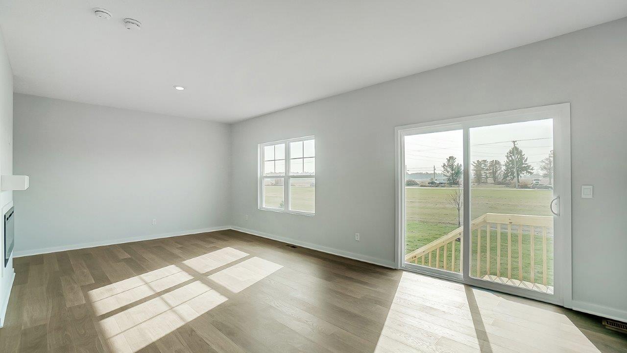 Open concept first floor with the living room, dining room and kitchen next to each other