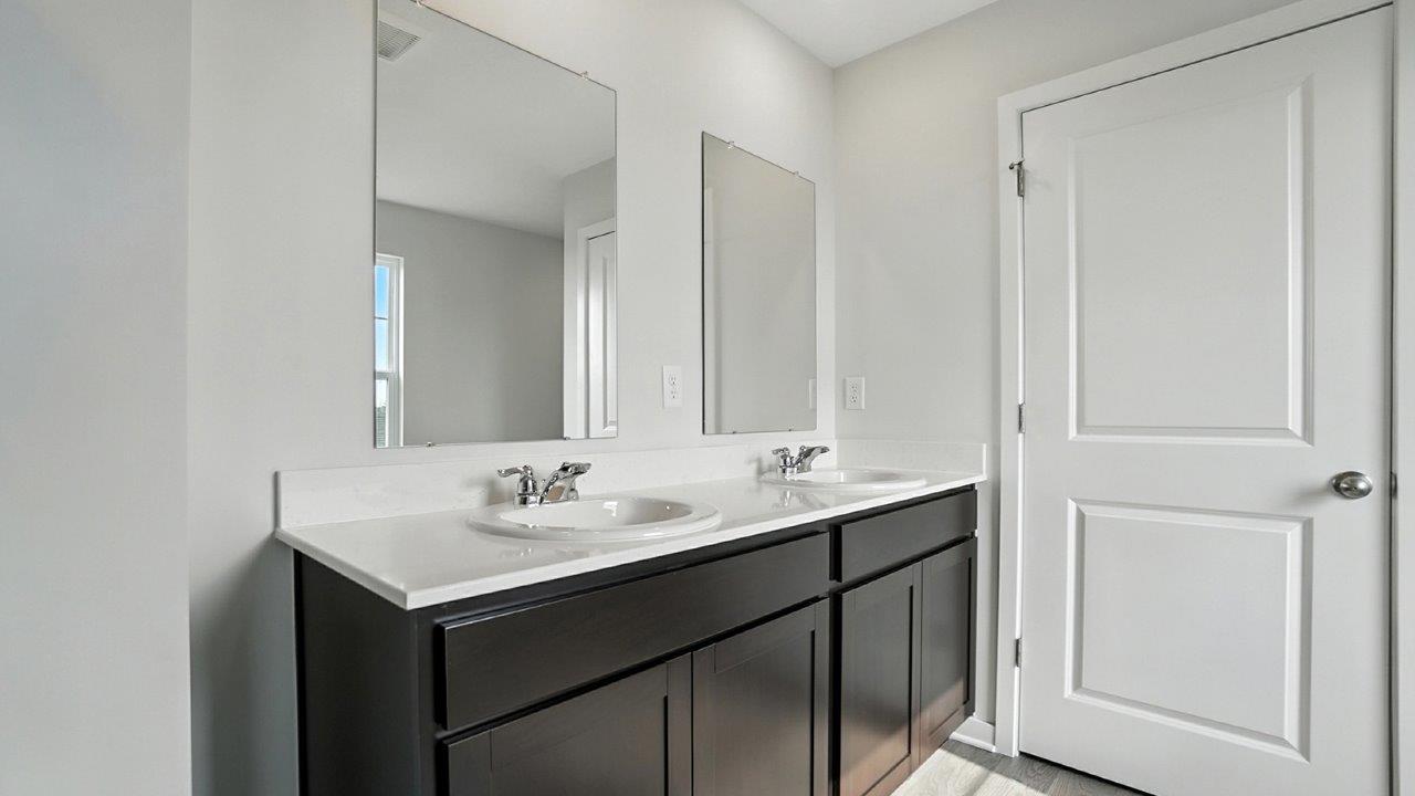 primary ensuite with double vanity