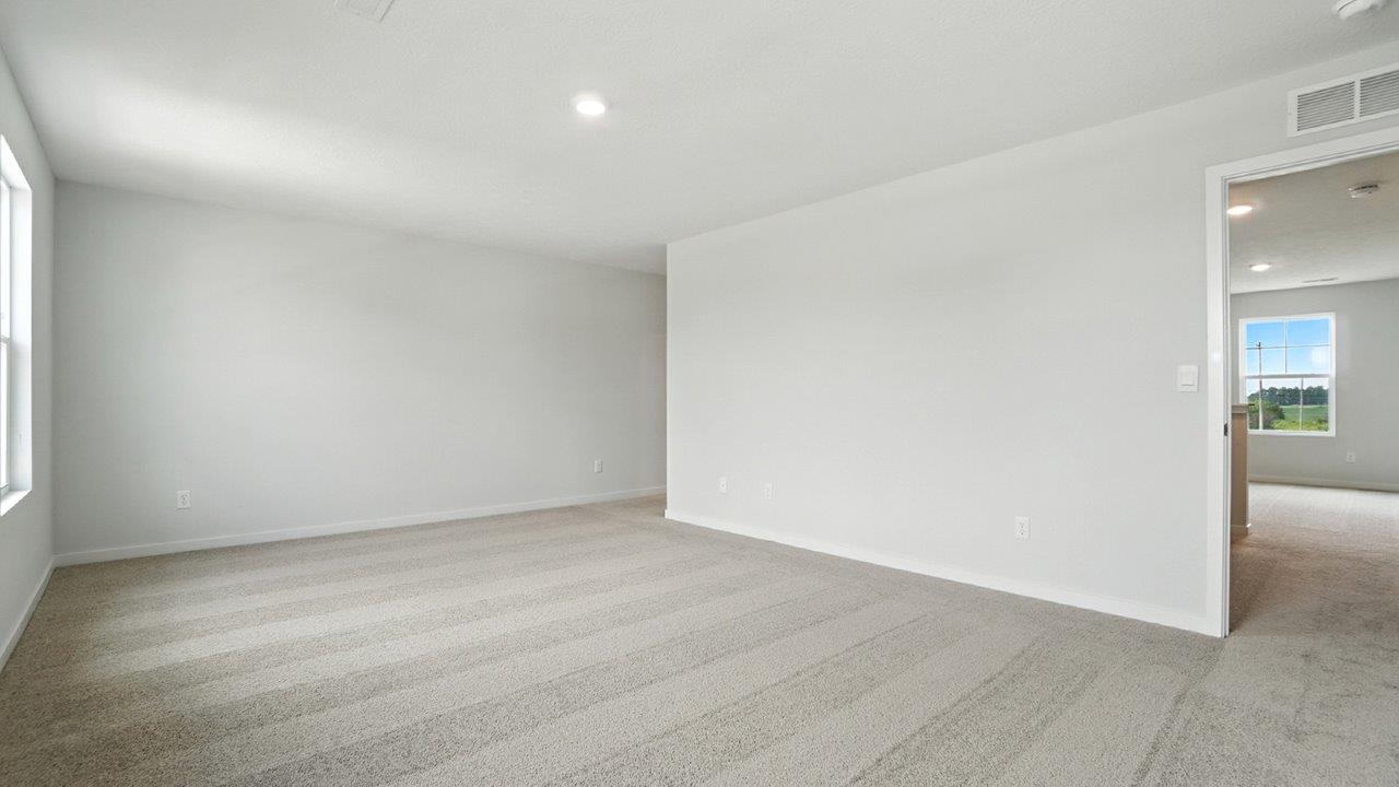 primary bedroom entry and ensuite bath