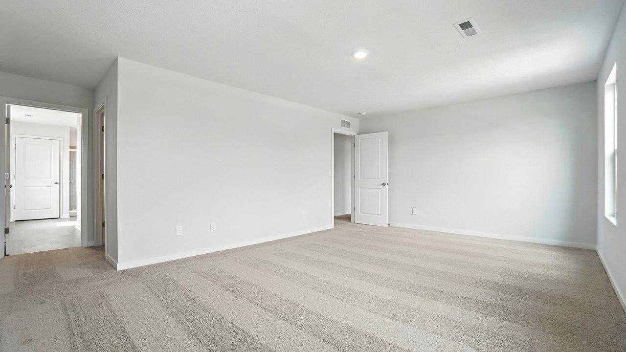 primary bedroom entry and ensuite bath