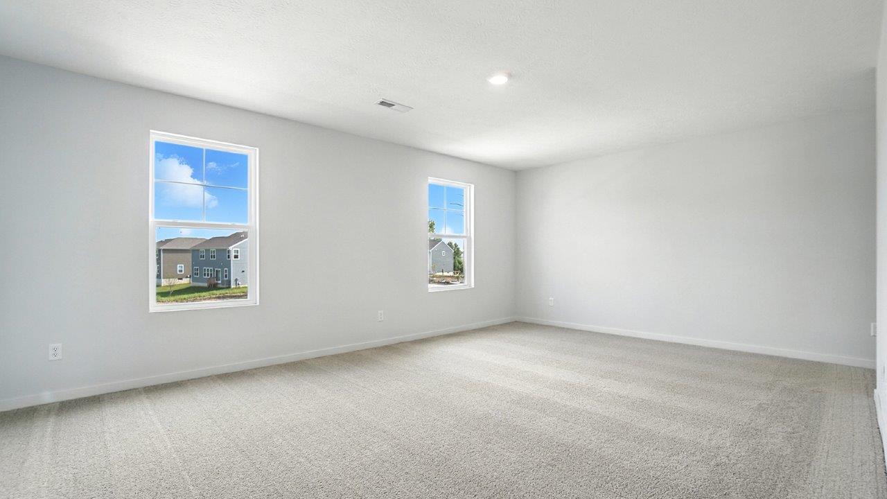 primary bedroom with single windows