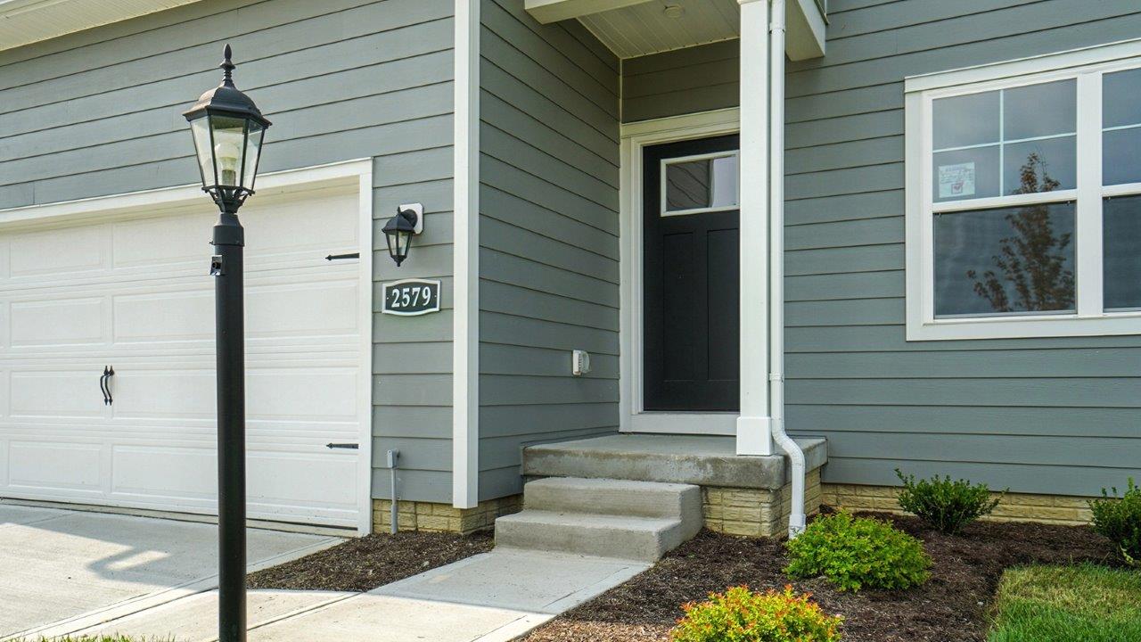 two car garage and covered entry