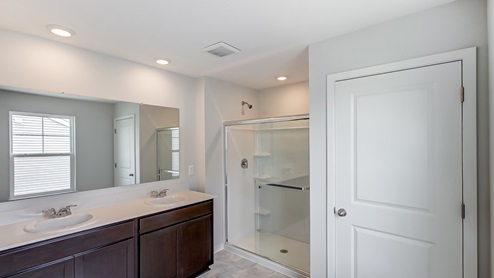 ensuite bath with double vanity, walk in shower