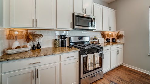 kitchen cabinetry, countertops and appliances