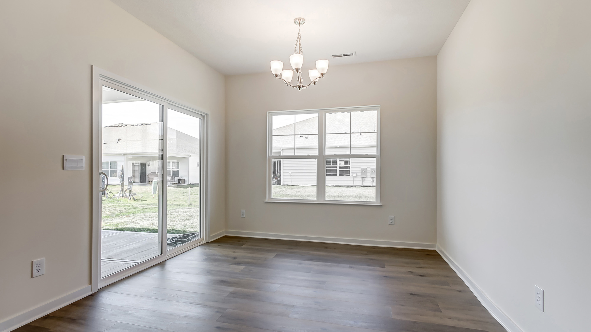 Bright dining area with neutral walls.