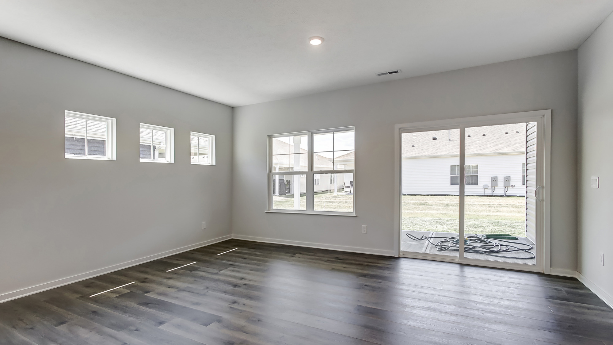 Bright dining area with neutral walls.