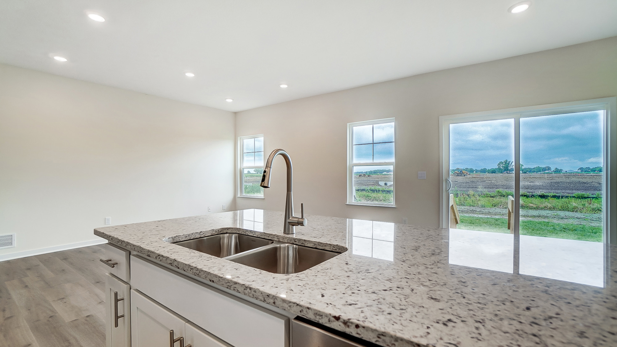 Kitchen island overlooking spacious living area.