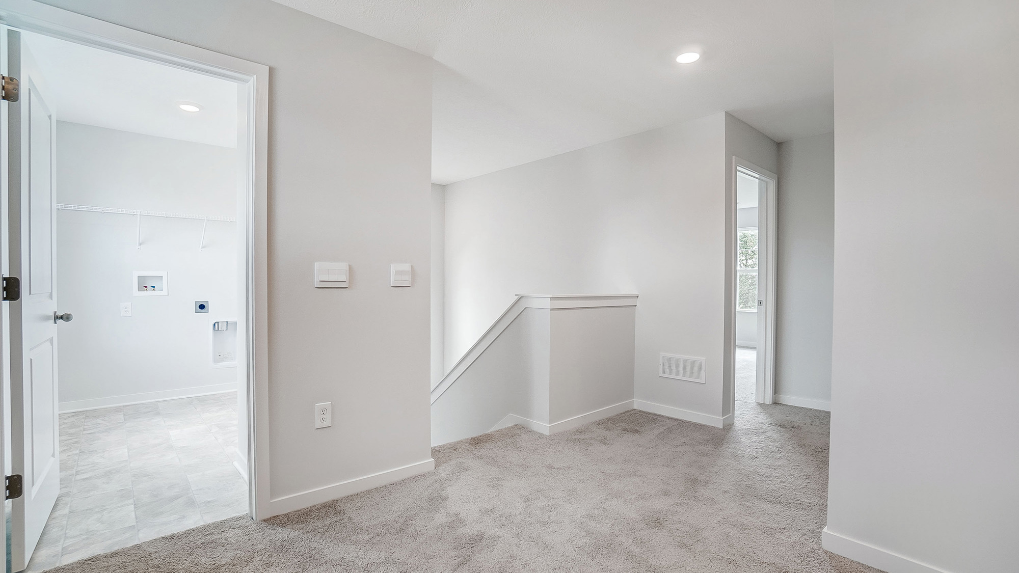 Open landing area at the top of the staircase.