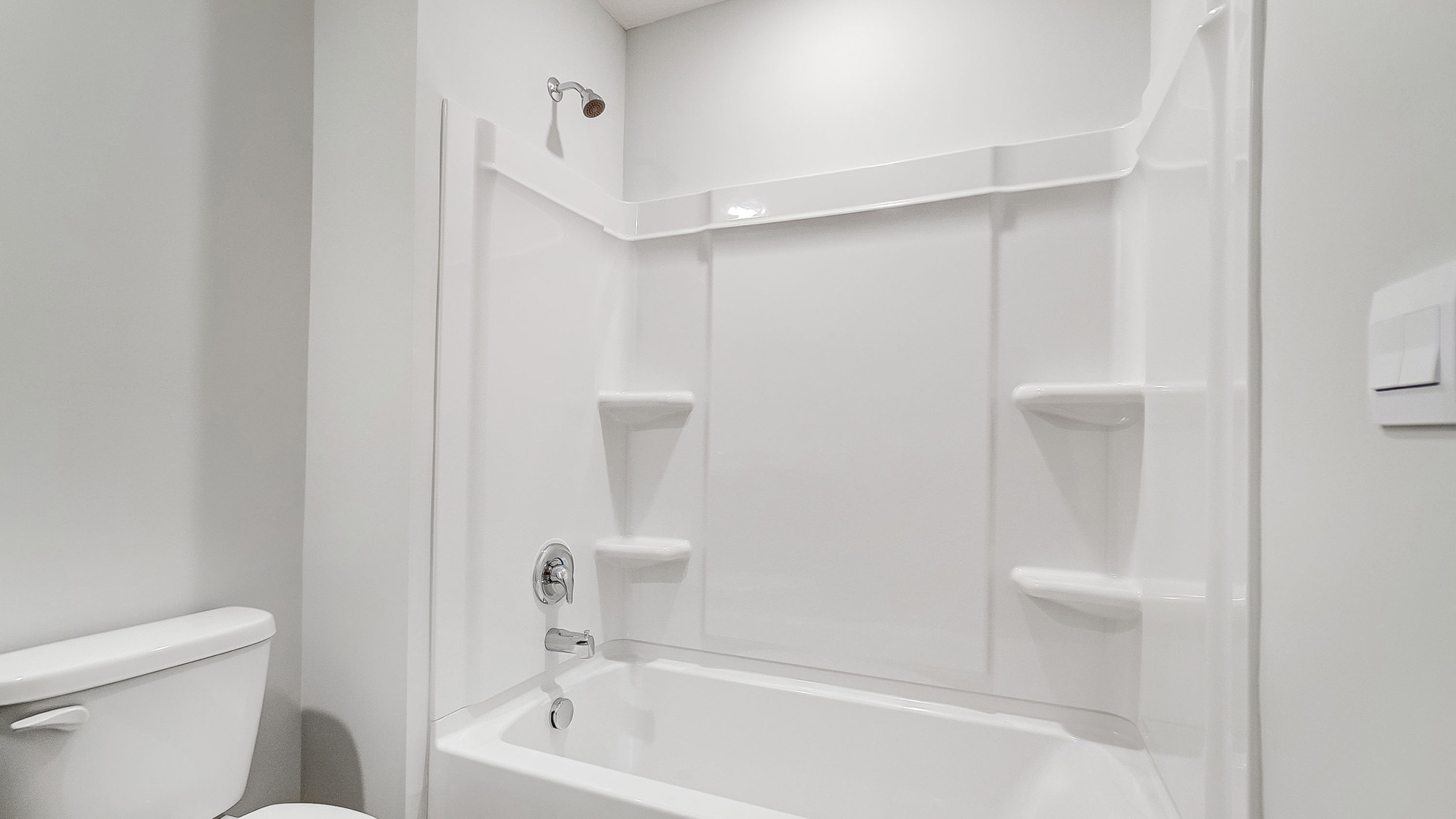 Modern bathroom featuring a shower tub.