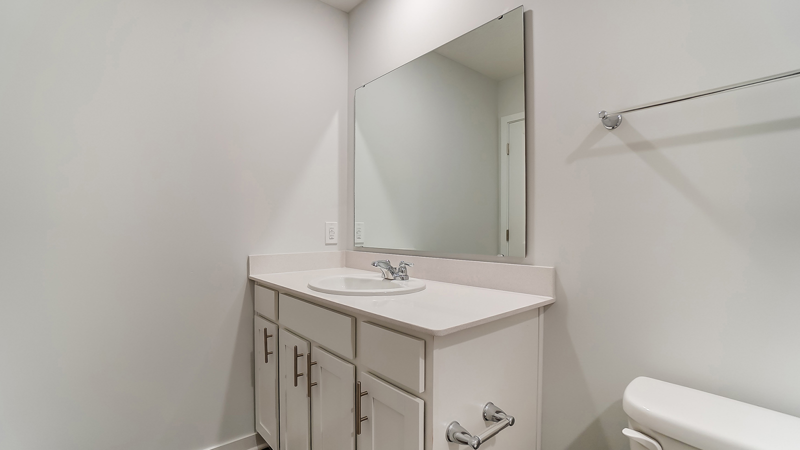 Bathroom featuring a sink and toilet.