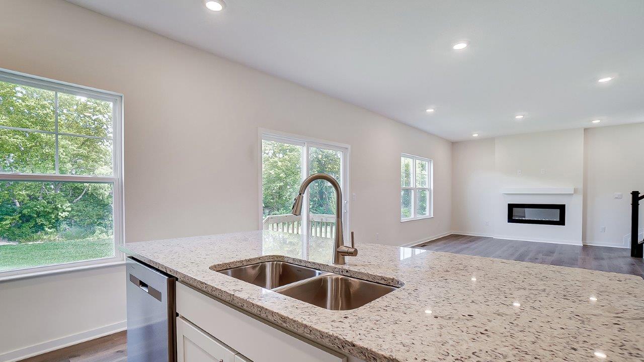 Kitchen island overlooking spacious living area.