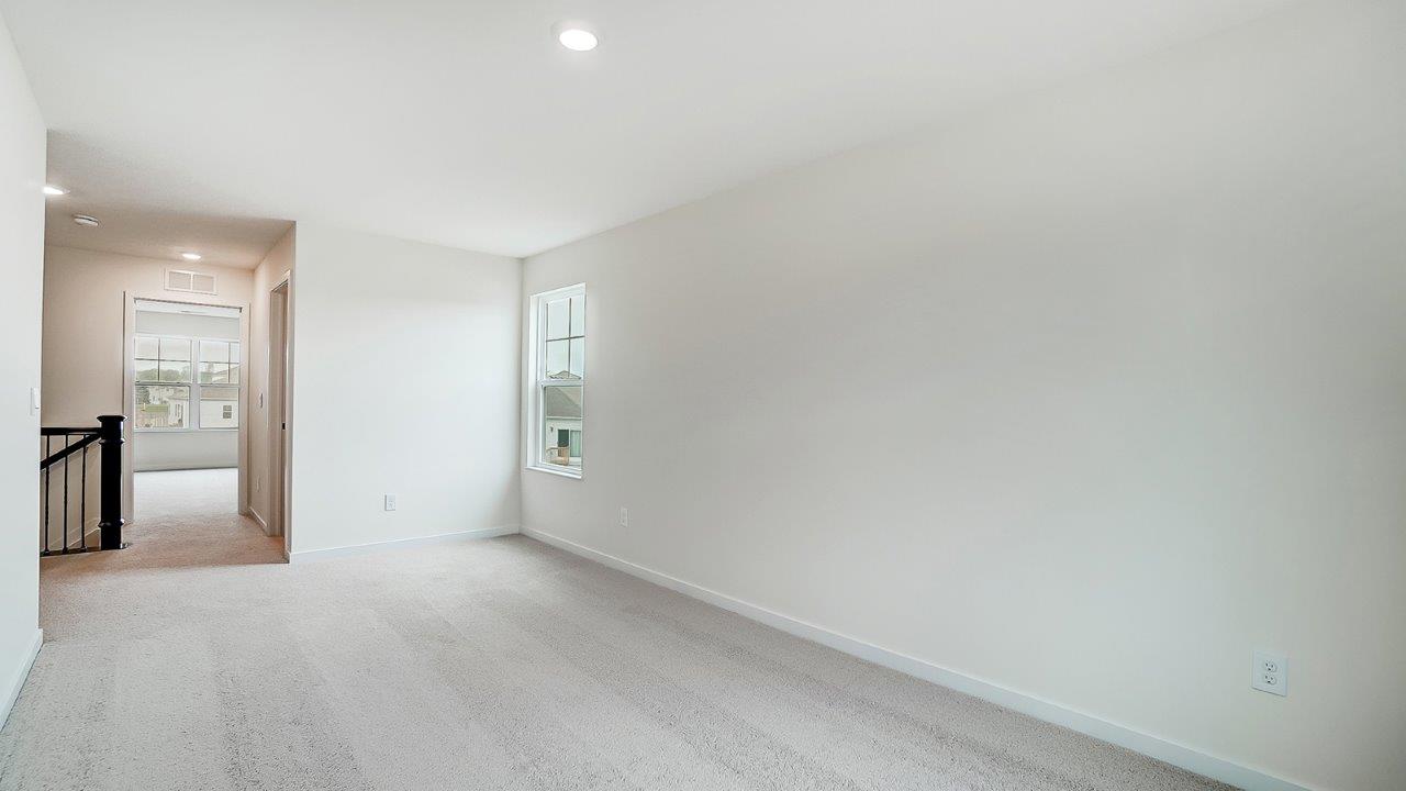 Top of stairs leading to loft area.