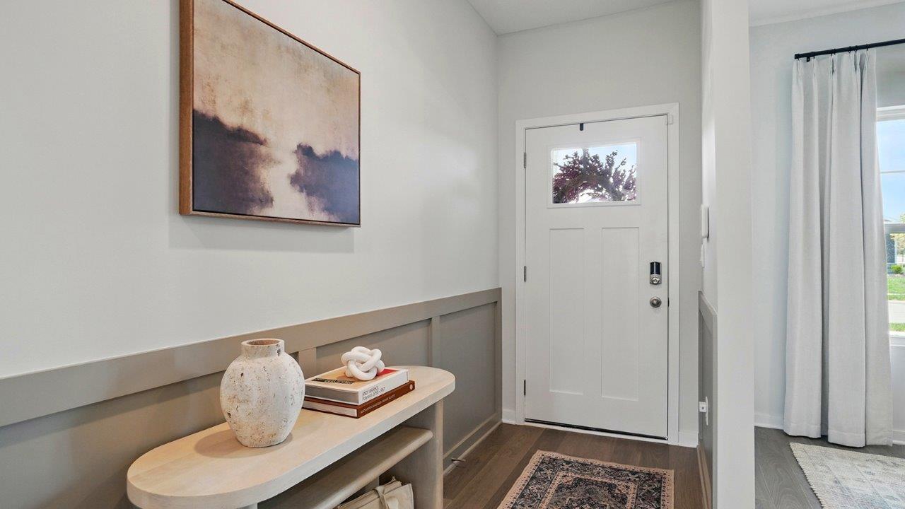Entryway with bright hallway.