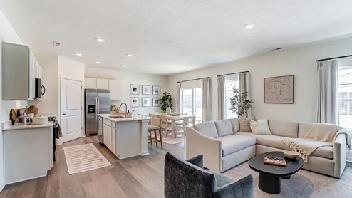 furnished great room, dining and kitchen