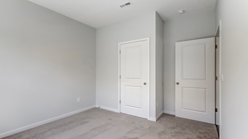 third bedroom closet and entry