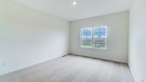 primary bedroom with double window