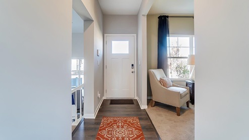 model home entry with flex office space