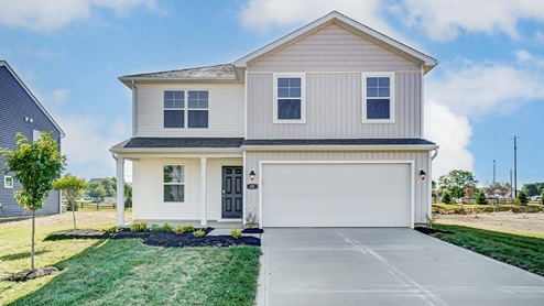two story home with white siding, covered front porch and two car garage
