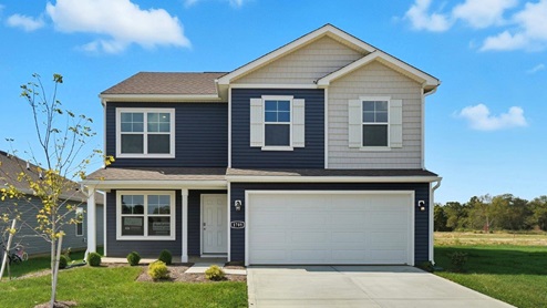 two story home with white and blue siding, covered front porch and two car garage