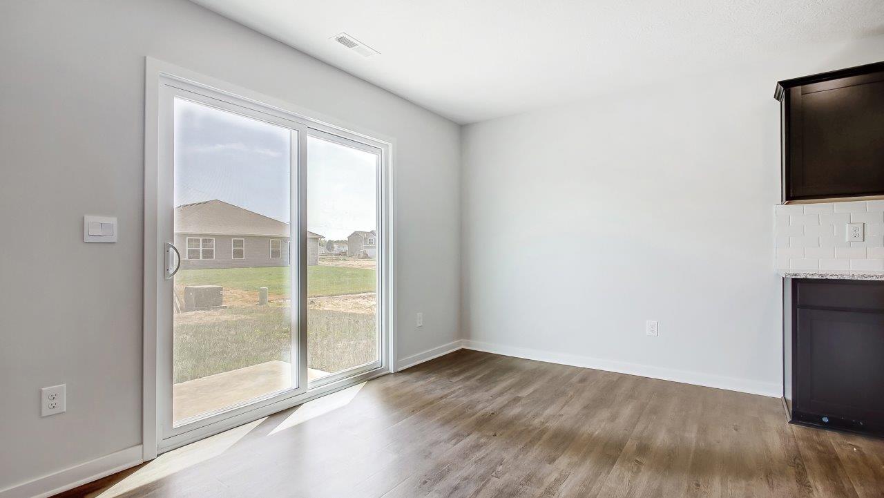 dining space with rear sliding door