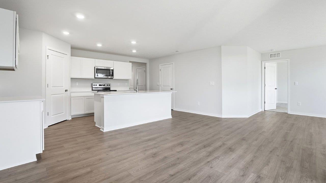 dining space, kitchen and great room