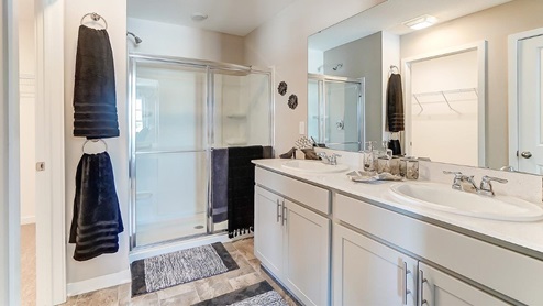 model home bathroom double vanity and shower