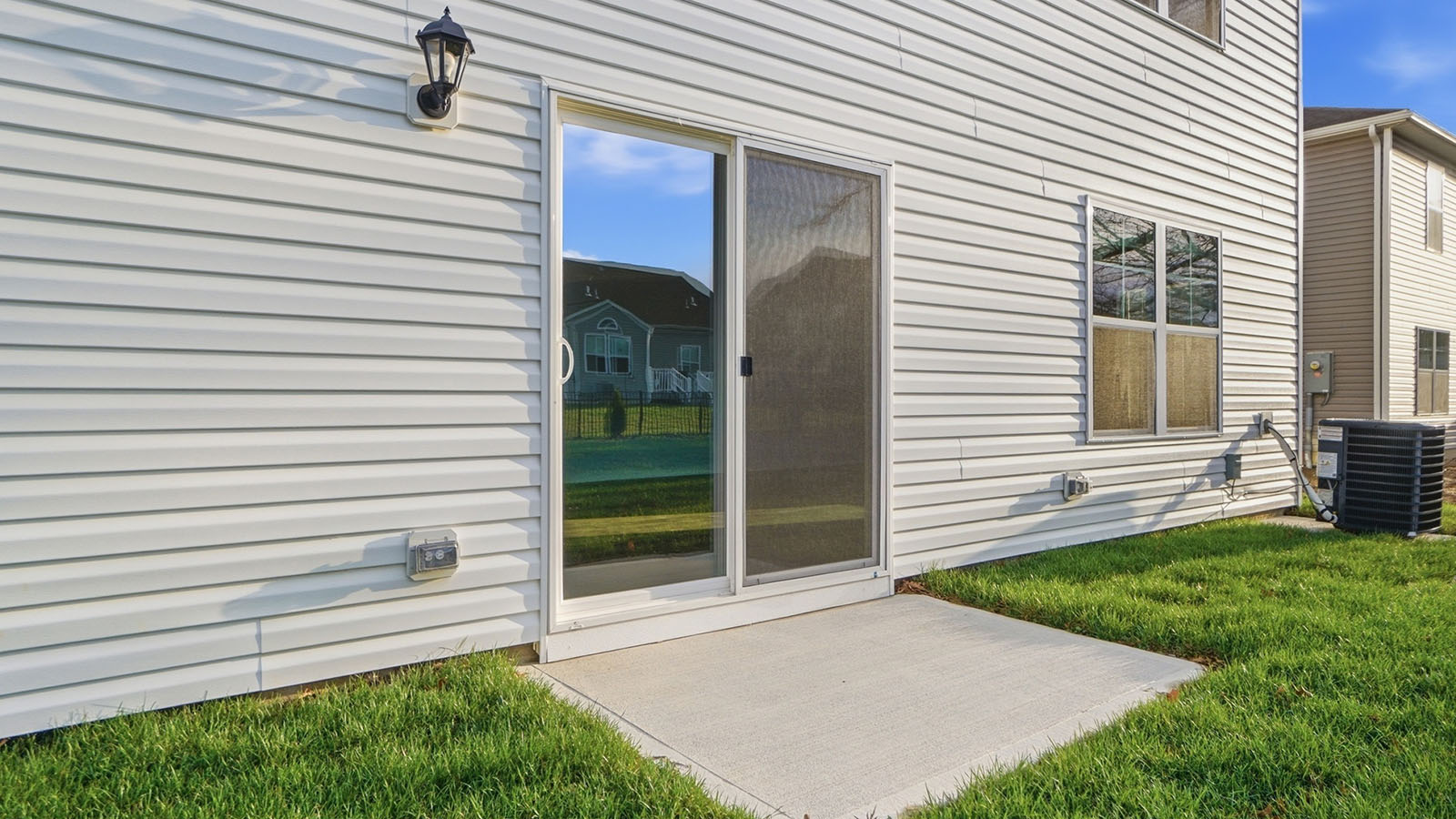 rear sliding door and concrete pad