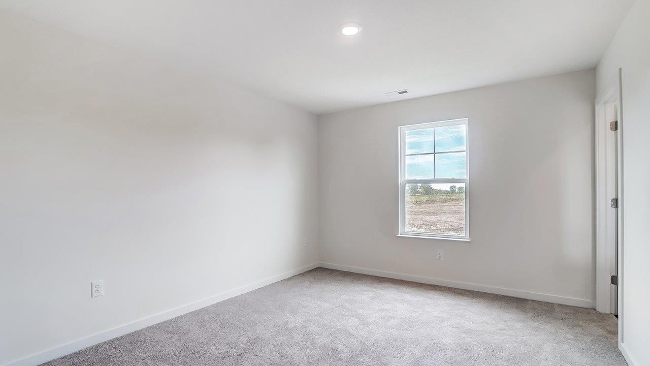 primary bedroom with single window