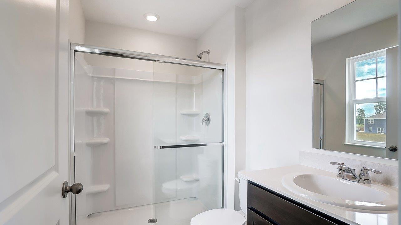 ensuite bath vanity, toilet and walk in shower