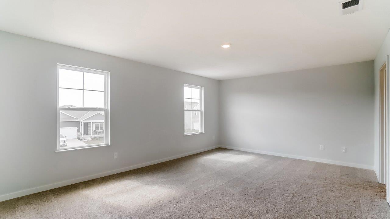 primary bedroom with single windows
