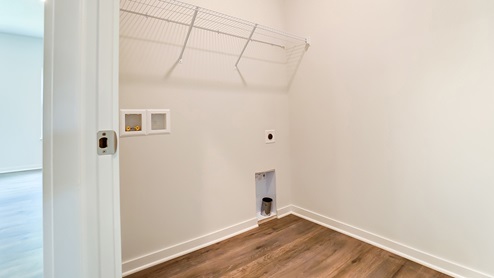 laundry room with wire shelving