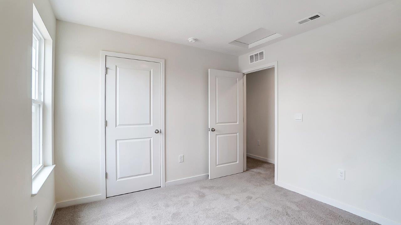 second bedroom closet and entry