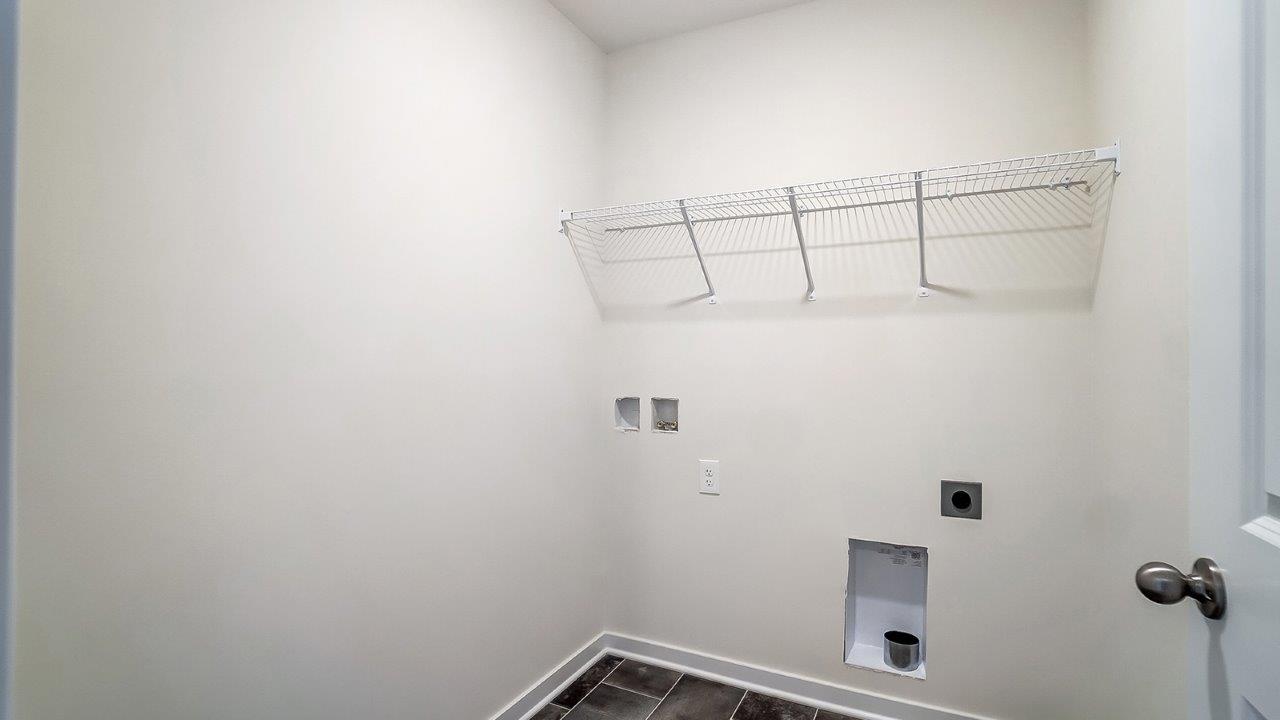 laundry room with wire shelving