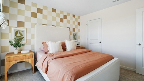 furnished second bedroom and closet