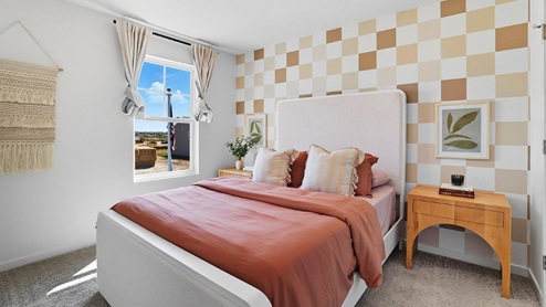 furnished second bedroom with single window
