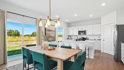 dining table and chairs, rear sliding door, kitchen