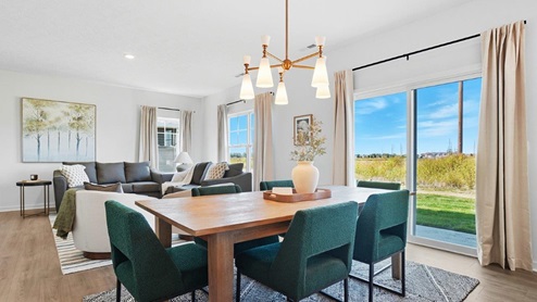 dining table and chairs, rear sliding door, great room
