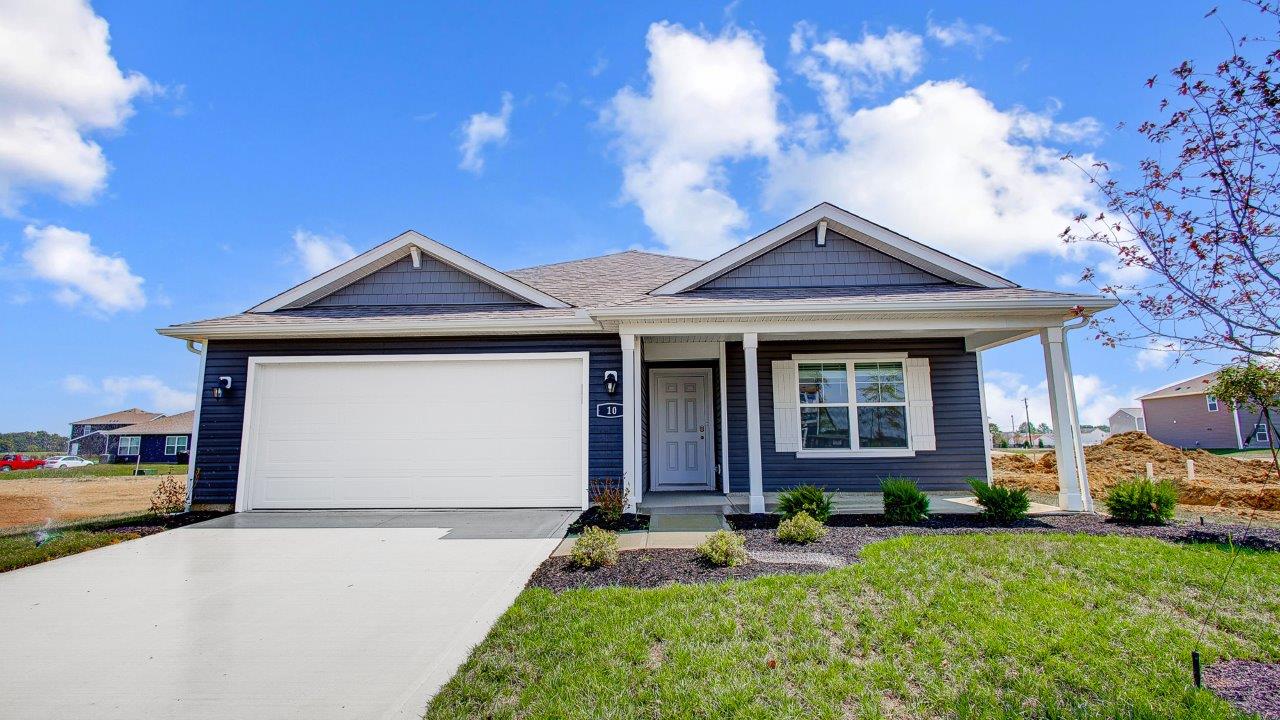 The Harmony, Columbus, OH, Lansdown Farms By D.R. Horton one-story 3-bedroom, 2-bath, two-car garage, green grass front
