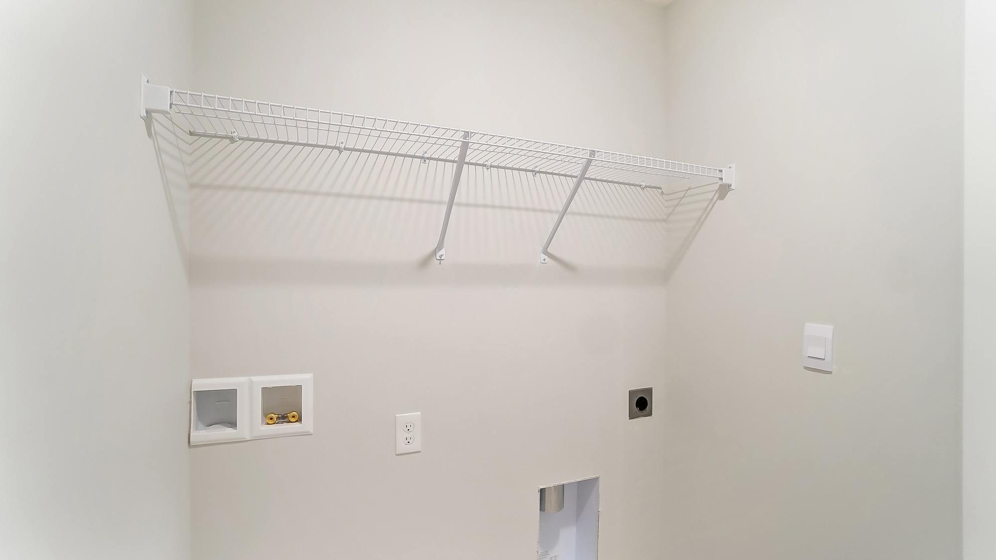 Lansdowne Farms utility laundry smartly designed with overhead organized storage, a drop zone, with new washer, dryer included