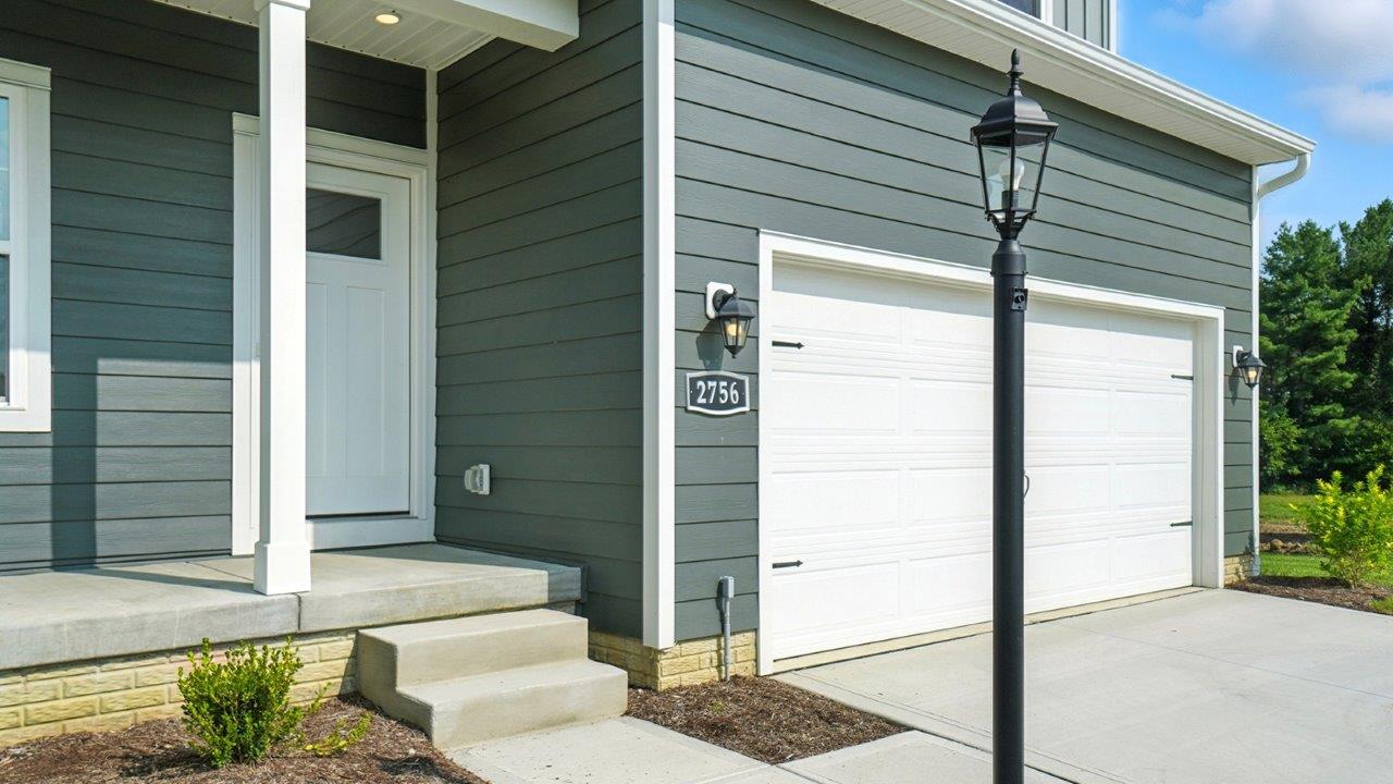 Street view of Front Door and Porch with main living access with sightlines in Lansdowne Farms